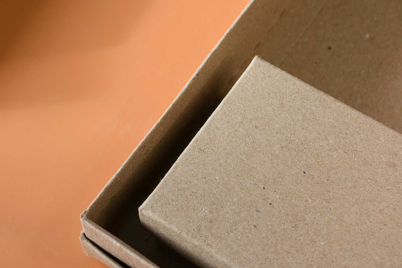 an open cardboard box sitting on top of a table